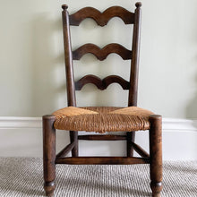 Load image into Gallery viewer, Vintage French wooden ladder-backed oak children&#39;s chair with rush seat - Moppet
