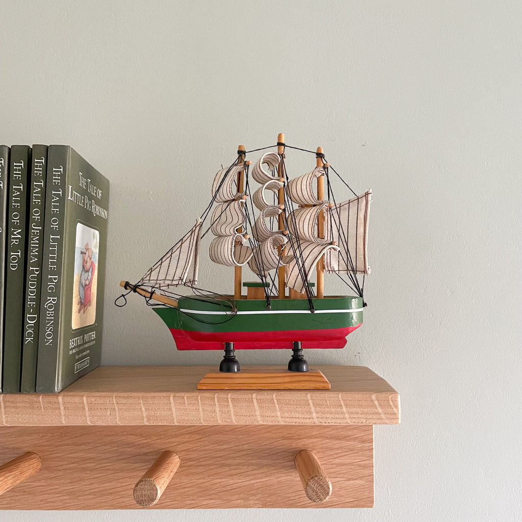 Vintage wooden model sailing ship in green and red - Moppet