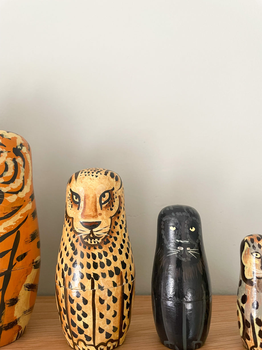 Vintage wooden big cat nesting Russian Matryoshka dolls, lion