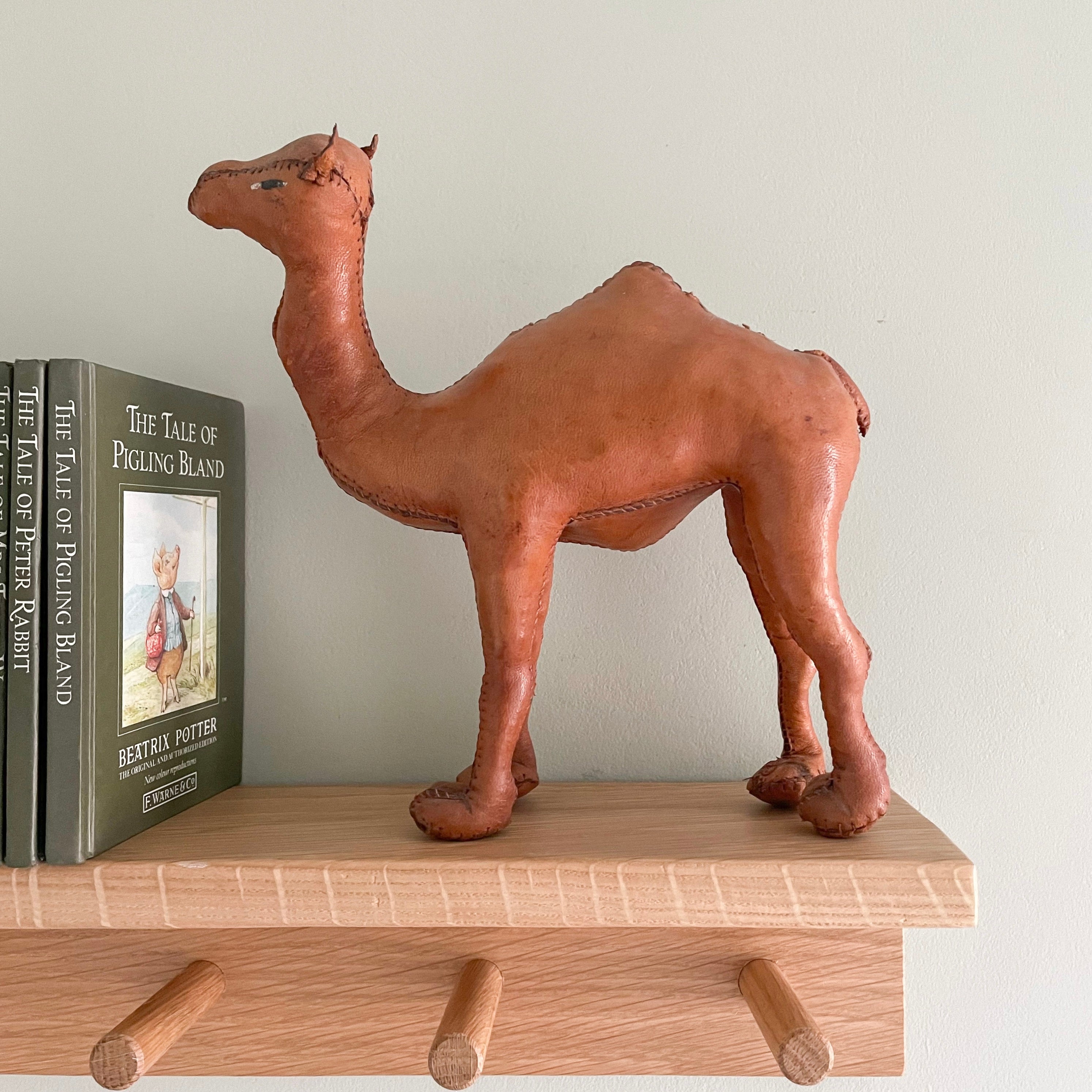Vintage leather-wrapped wooden camel figurine - Moppet