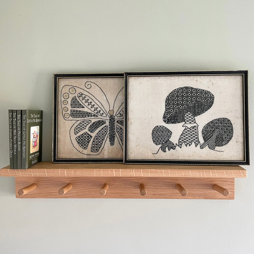 Pair of vintage Swedish framed monochrome embroideries in black and white, toadstools/mushrooms and butterfly - Moppet