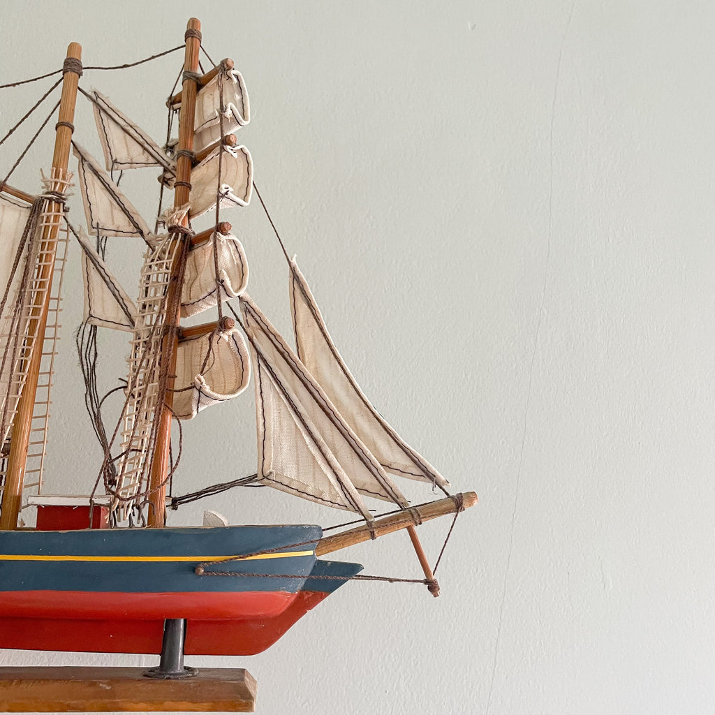 Vintage wooden model sailing ship with blue and red paintwork - Moppet