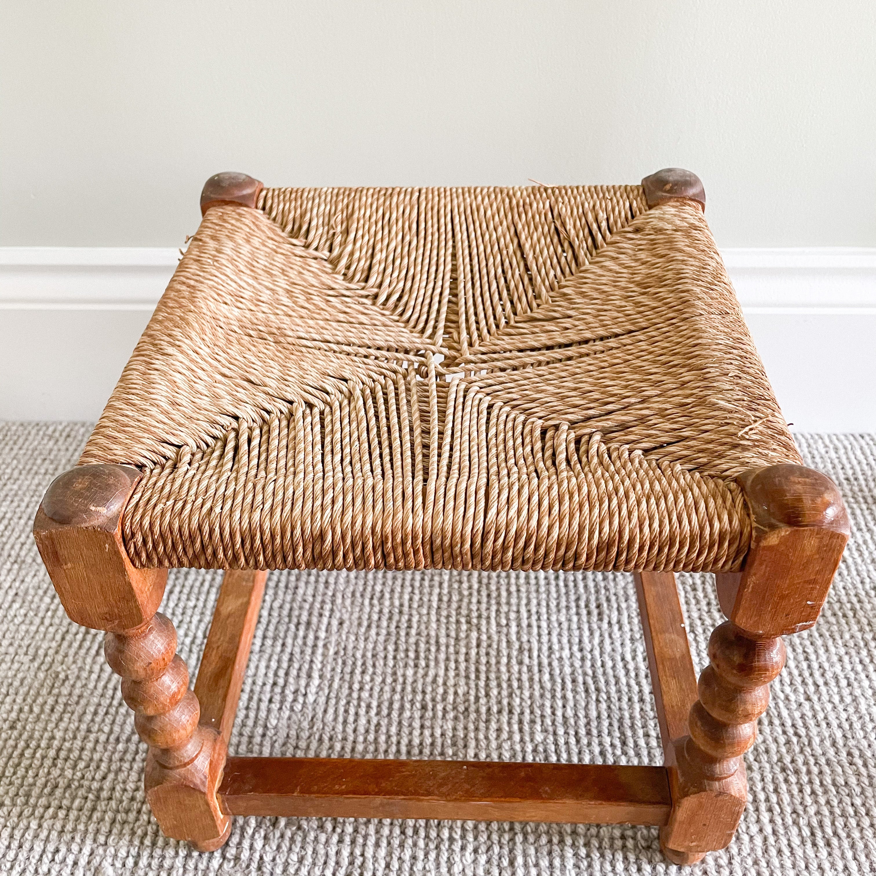 Vintage bobbin legged wooden stool with woven seat - Moppet