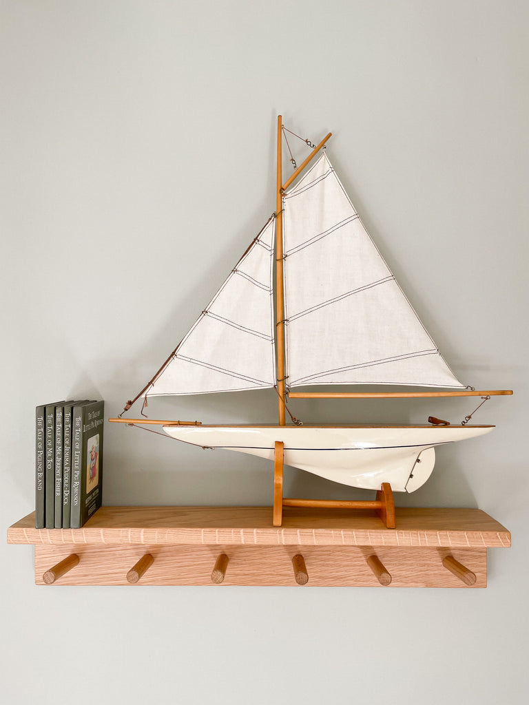 Vintage wooden model sailing boat, pond yacht or ship in white - Moppet