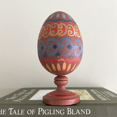 Vintage hand-painted folk art wooden egg decoration on pedastal - Moppet