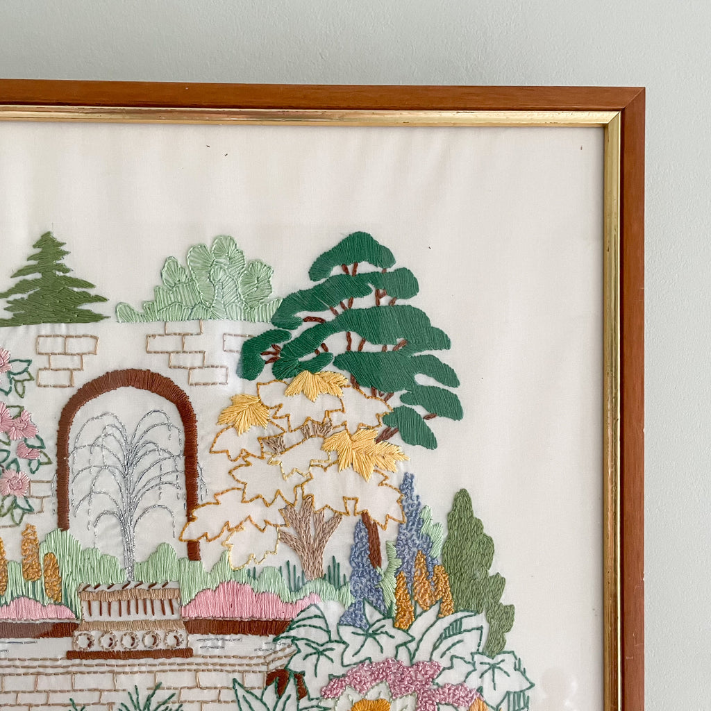 Vintage framed children's embroidery or needlework of a garden fountain - Moppet
