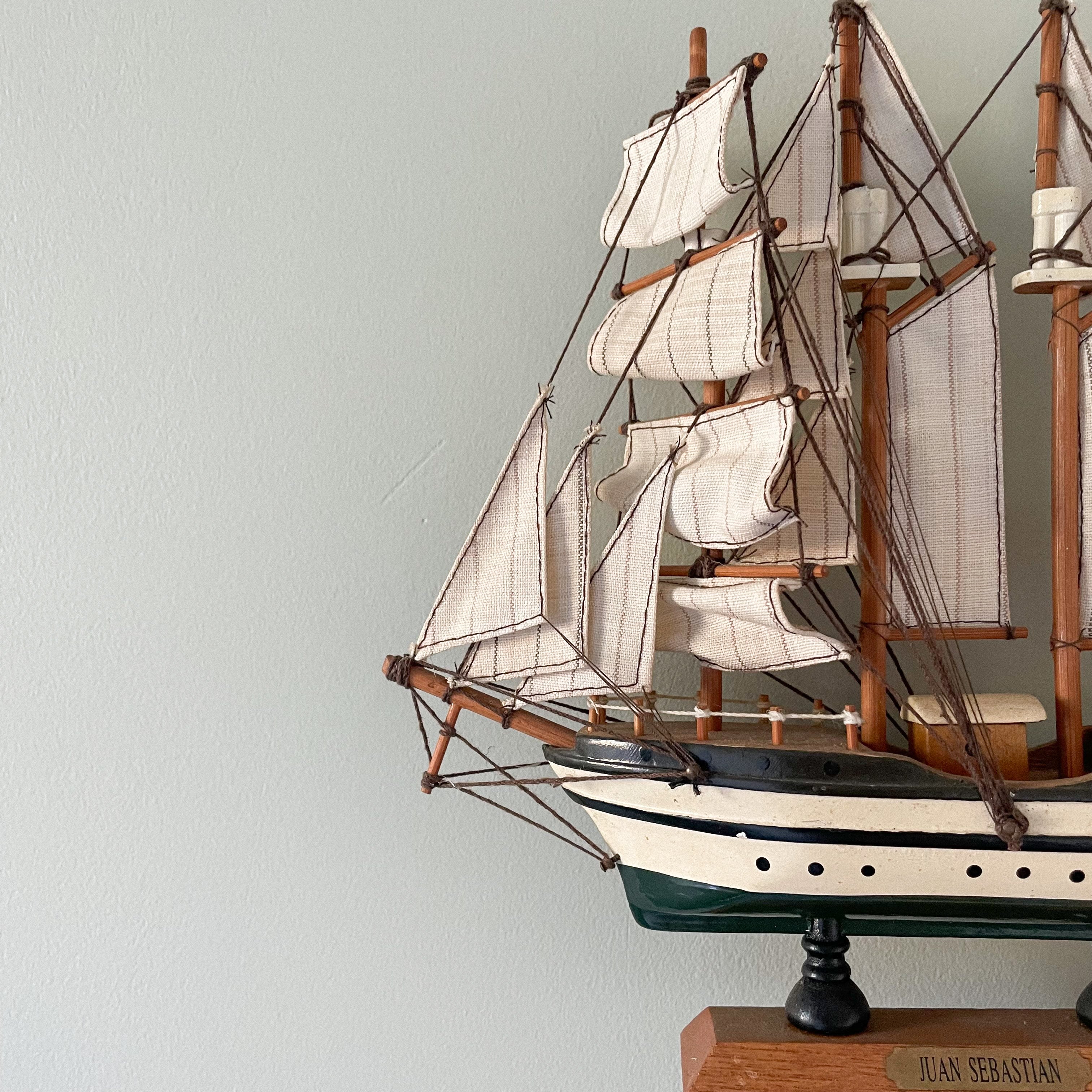 Vintage wooden model sailing ship in monochrome black and white, Juan Sebastian - Moppet