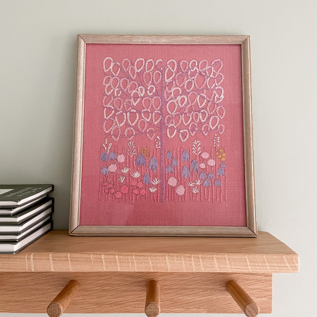 Vintage Swedish framed embroidery or needlework of a tree and flowers in pinks and lilacs - Moppet