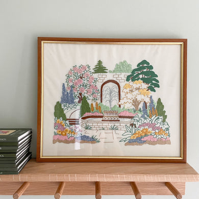 Vintage framed children's embroidery or needlework of a garden fountain - Moppet