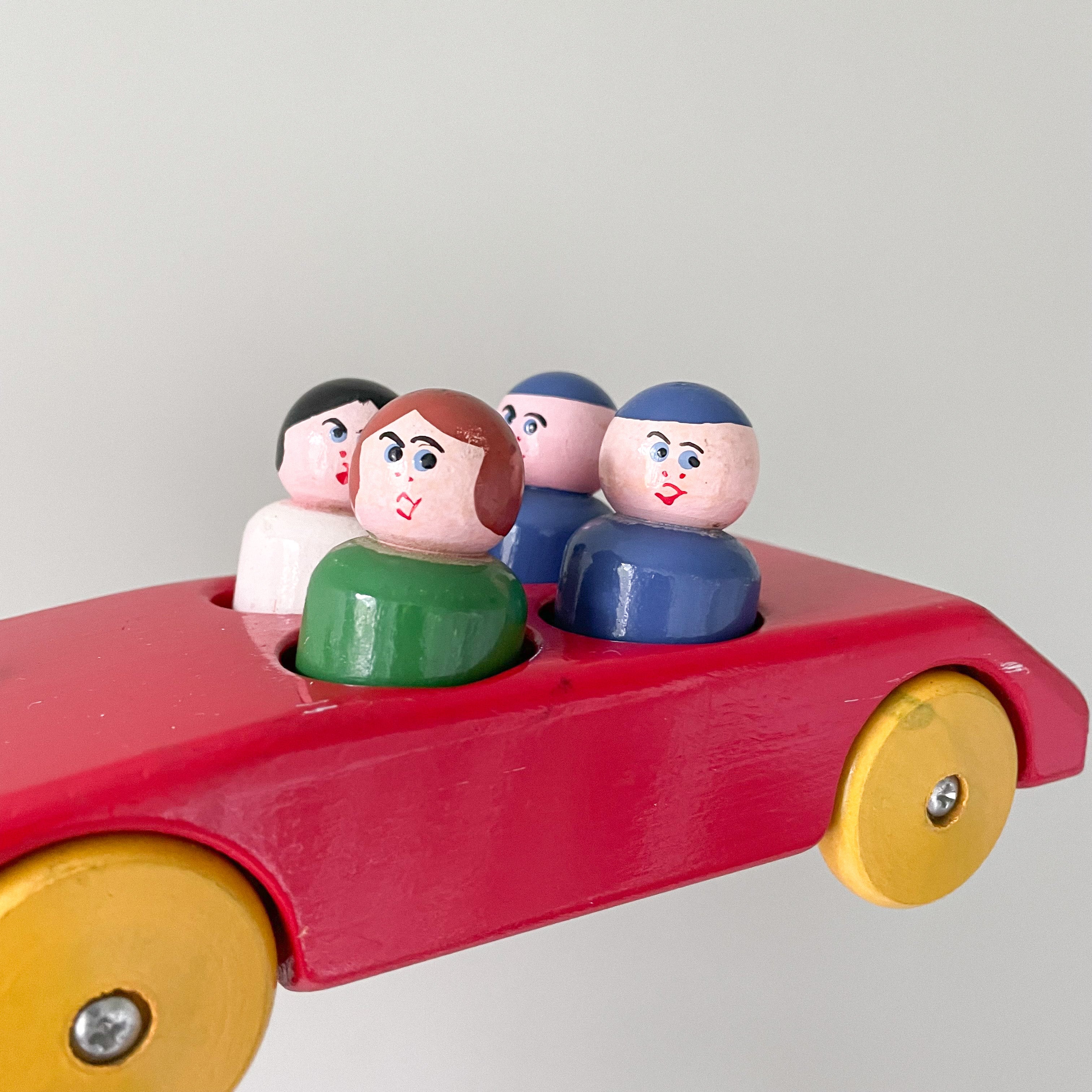 Vintage 1950s red wooden Escor car with four peg-doll passengers, British made - Moppet