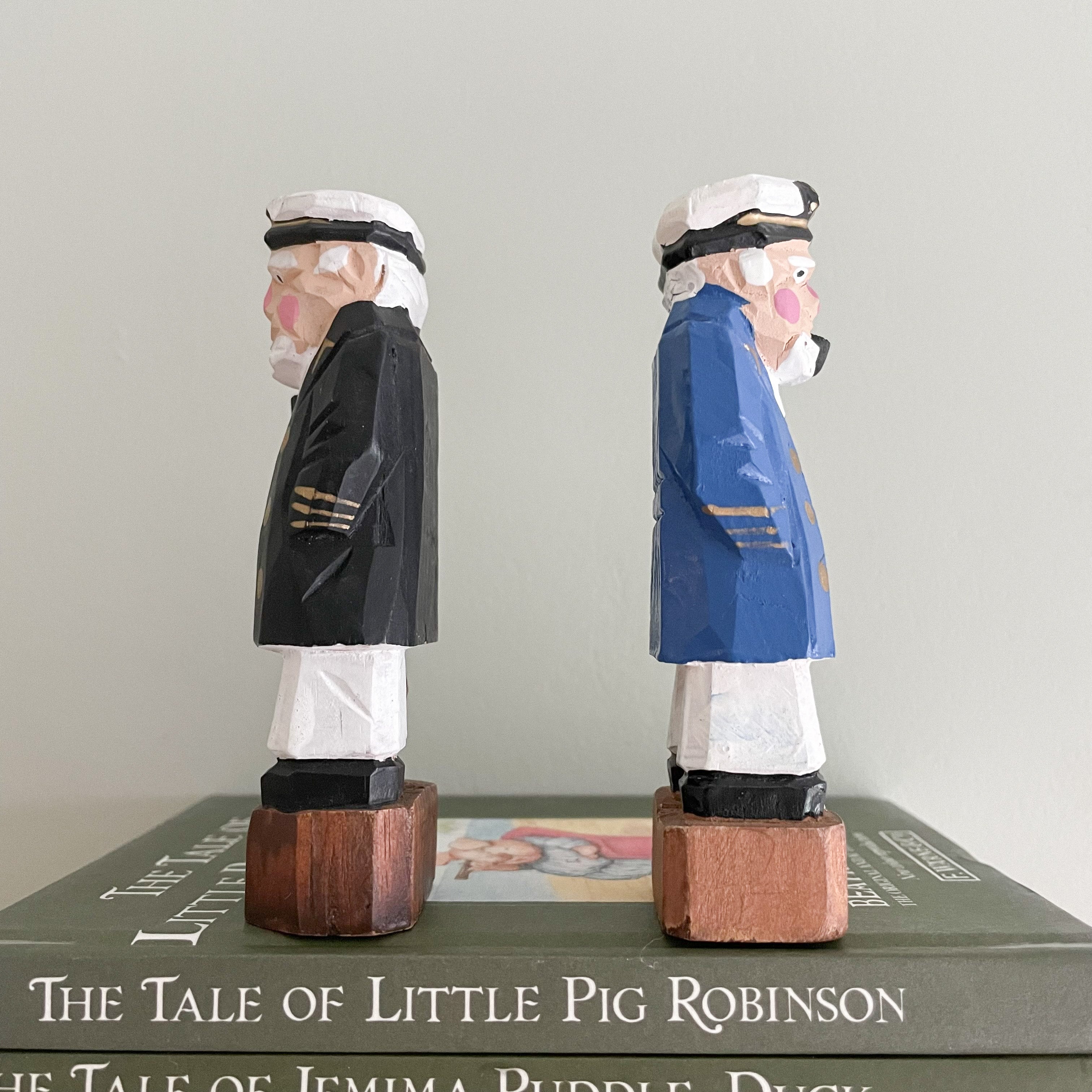 Pair of vintage hand-painted and carved folk art wooden ship’s captains - Moppet
