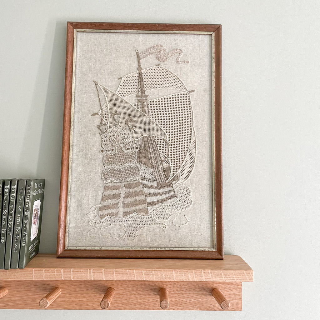 Vintage framed embroidery of a ship with neutral colour palette - Moppet