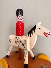 Load image into Gallery viewer, Vintage 1950s wooden Beefeater soldier on horse back, British made - Moppet

