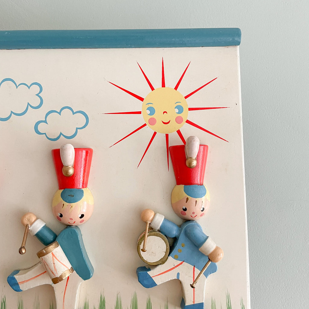 Vintage 1960s 'Irmi' wooden children's wall plaque featuring three wooden soldiers - Moppet