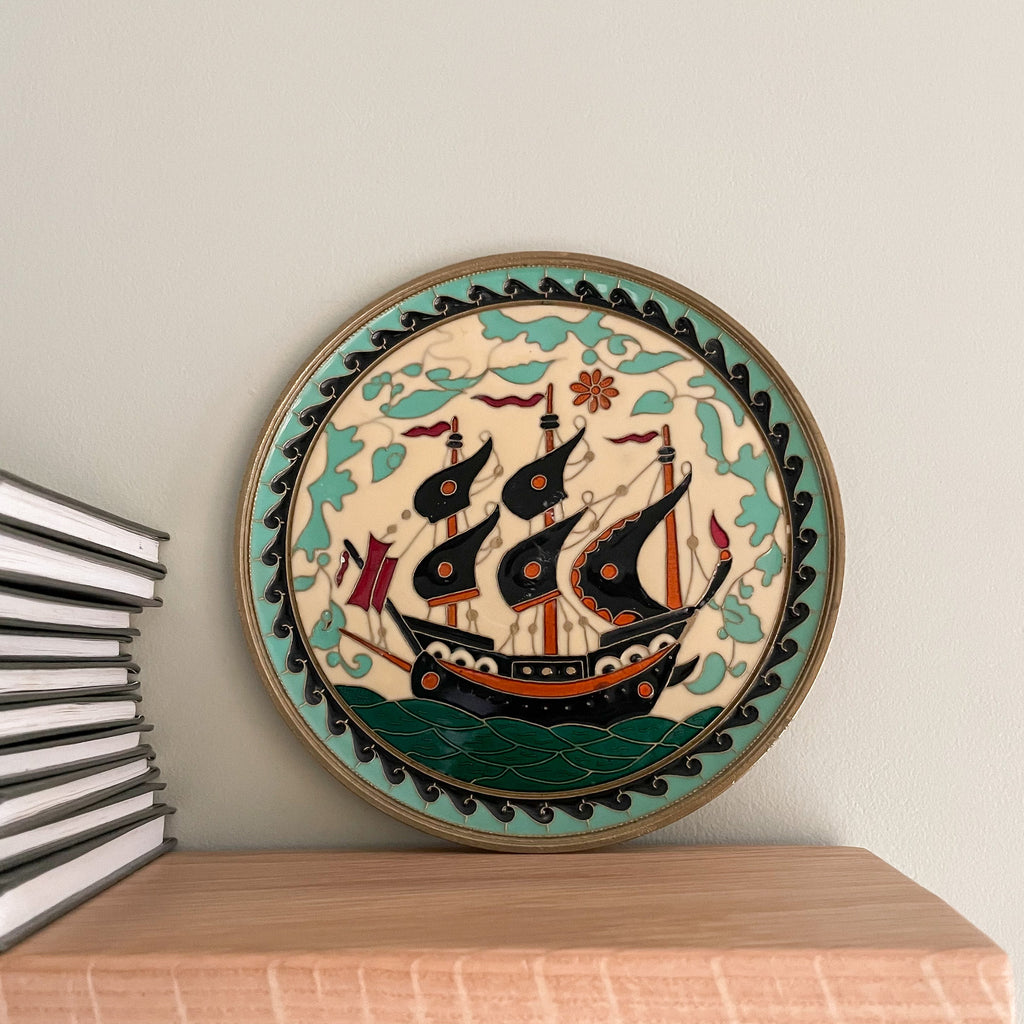 Vintage brass enamelled plate featuring a ship - Moppet