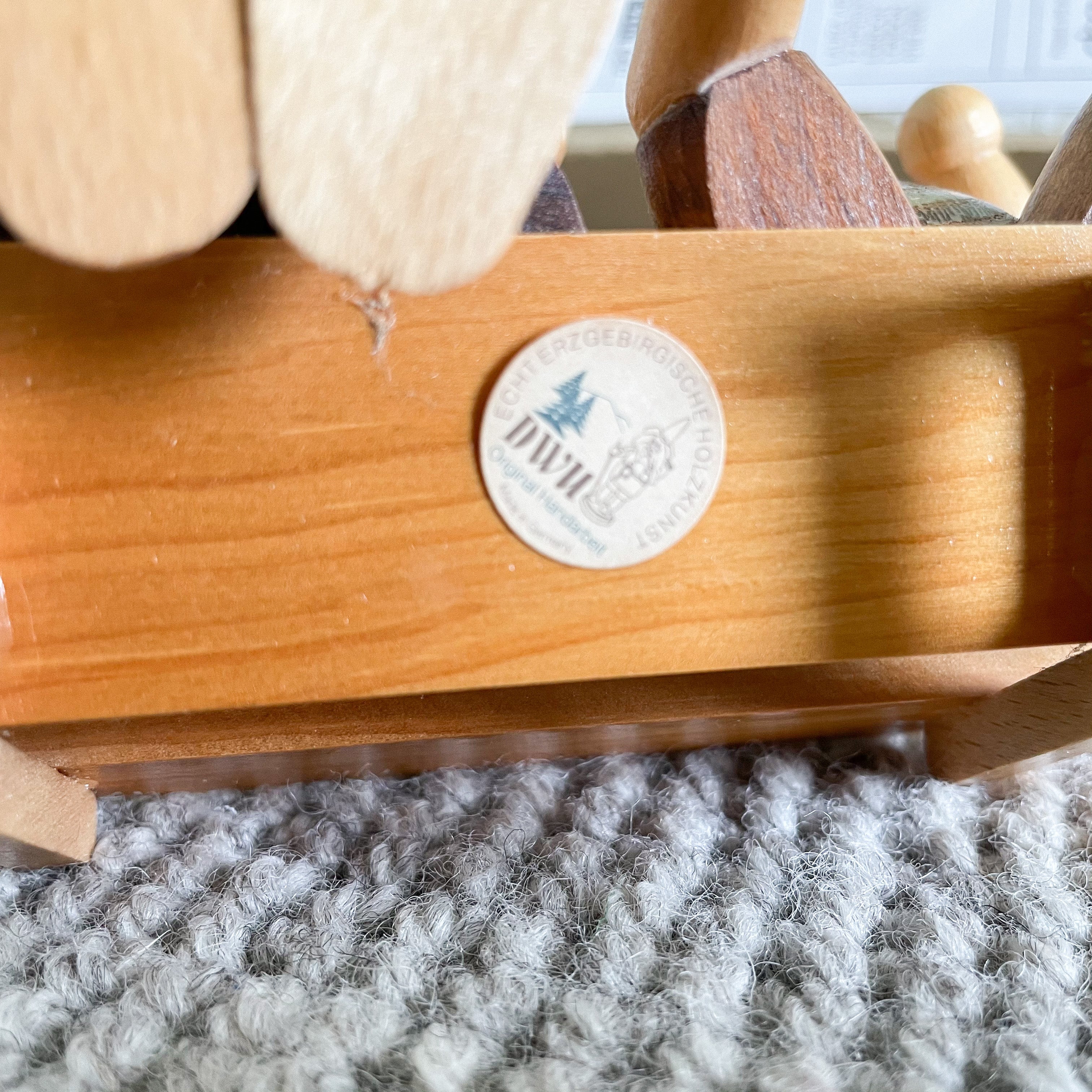 Vintage pair of wooden German bunny rabbits sat on a bench, by Erzgebirge Holzkunst DWU - Moppet