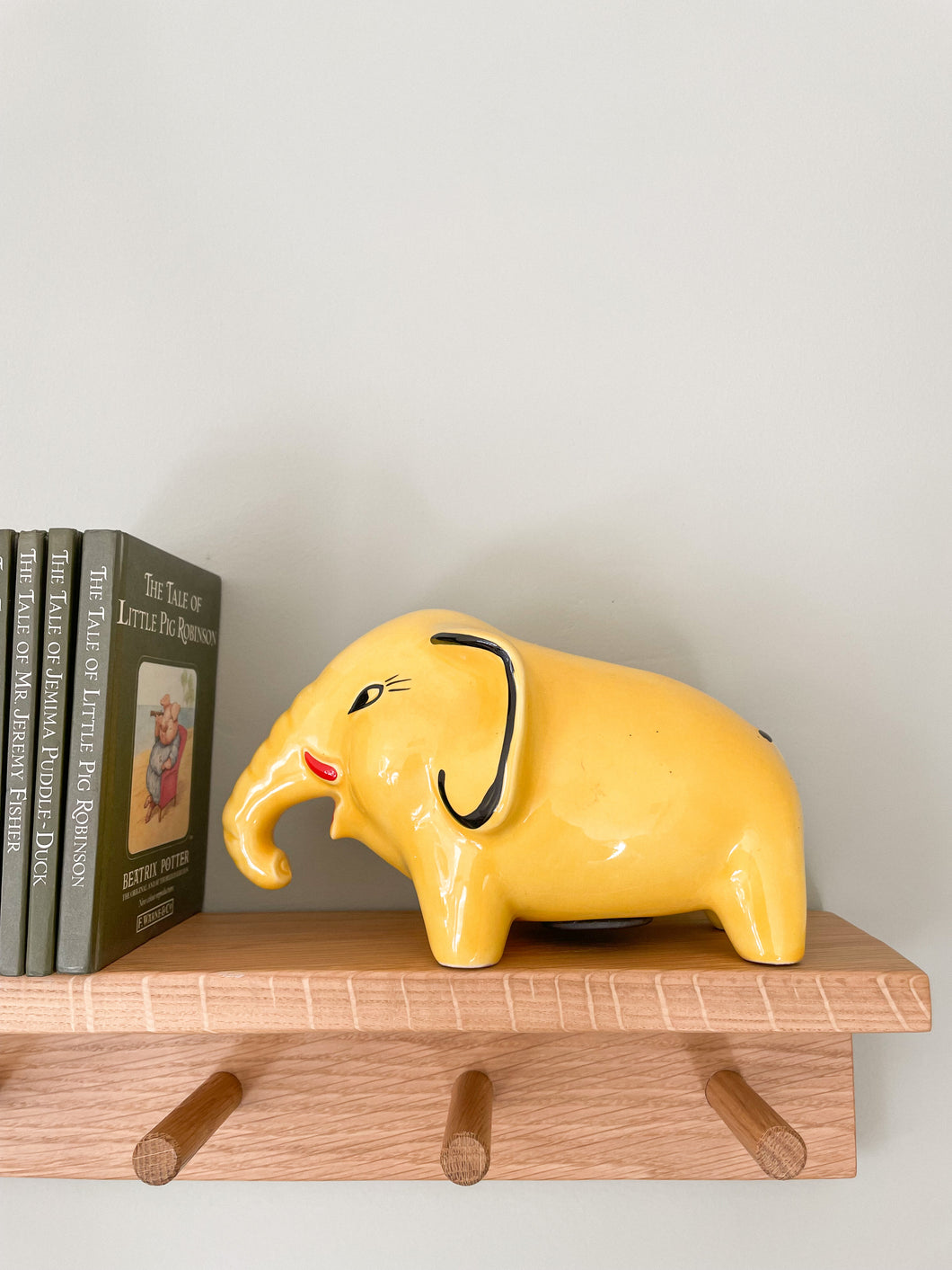 Vintage ceramic elephant piggy bank or money box in yellow, by Arthur Wood, made in Britain - Moppet