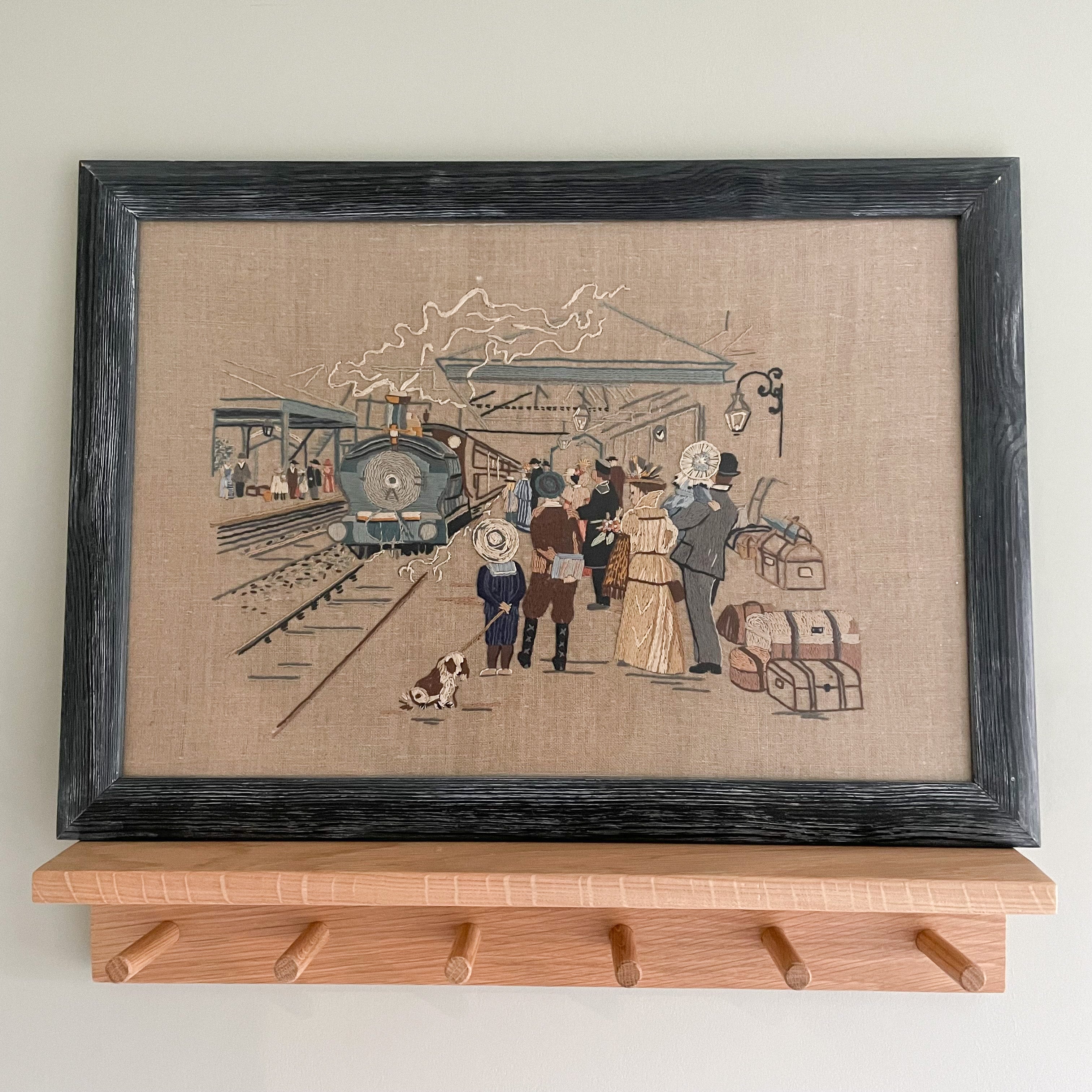 Vintage framed embroidery of train and passengers - Moppet