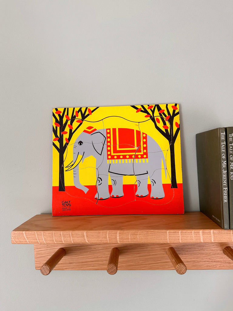 Vintage wooden elephant jigsaw puzzle, red and yellow, made in England by GALT - Moppet