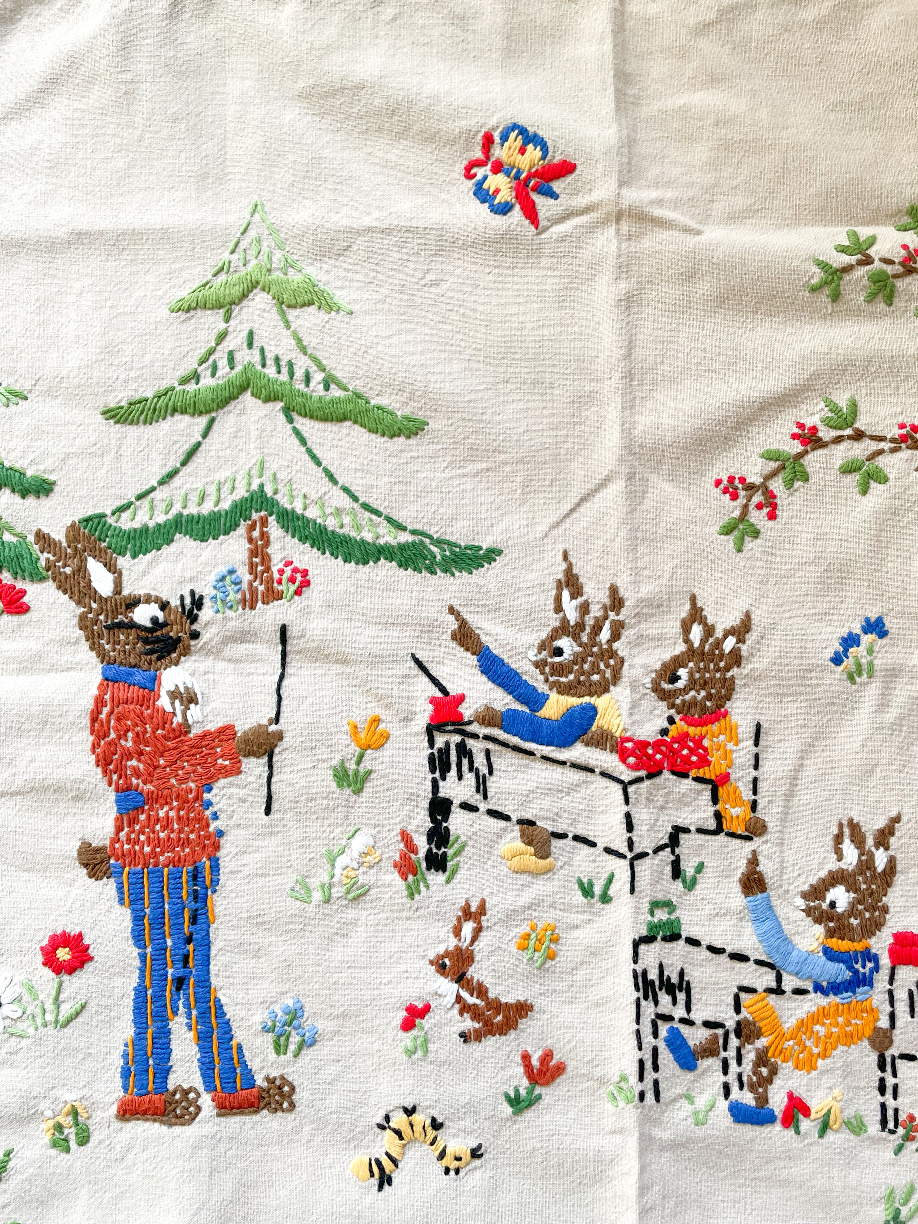 Vintage midcentury hand-embroidered Easter wall hanging tapestry or table cloth/runner featuring an Easter bunny rabbit school class room - Moppet