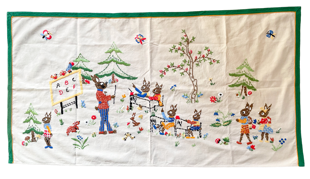 Vintage midcentury hand-embroidered Easter wall hanging tapestry or table cloth/runner featuring an Easter bunny rabbit school class room - Moppet