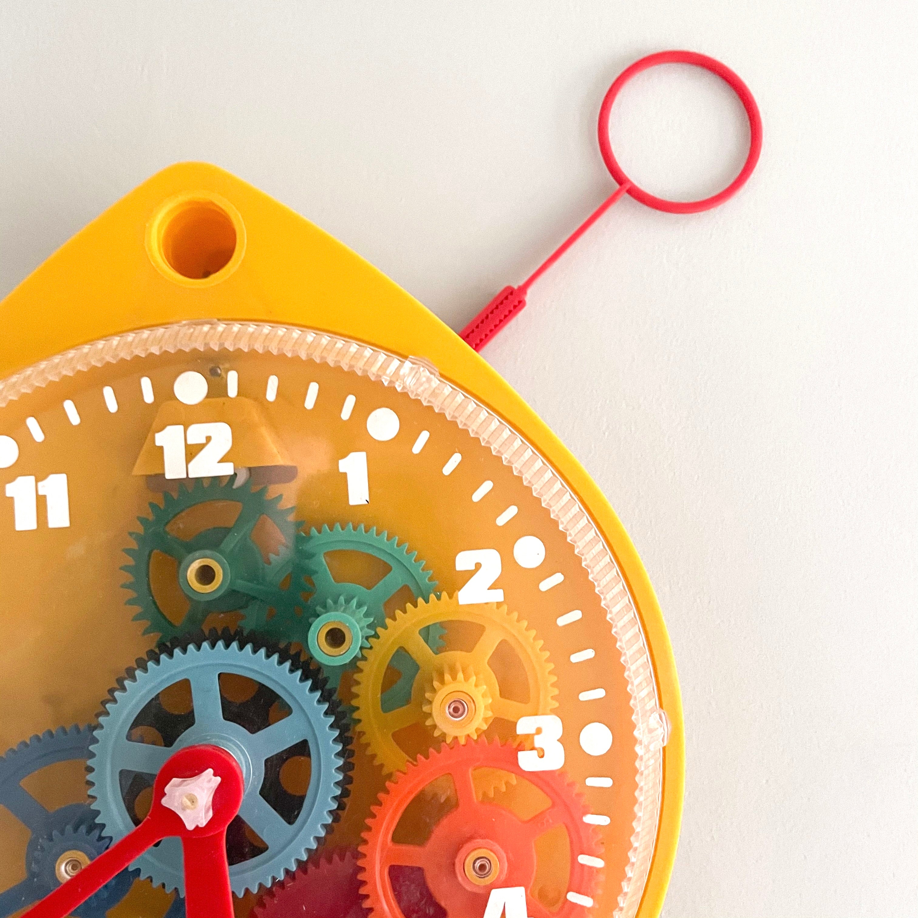 Vintage 1950s mechanical educational toy clock (yellow) - Moppet