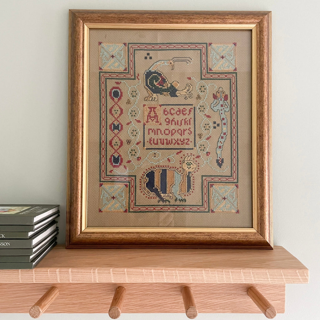 Vintage framed cross stitch embroidery of alphabet and cat - Moppet