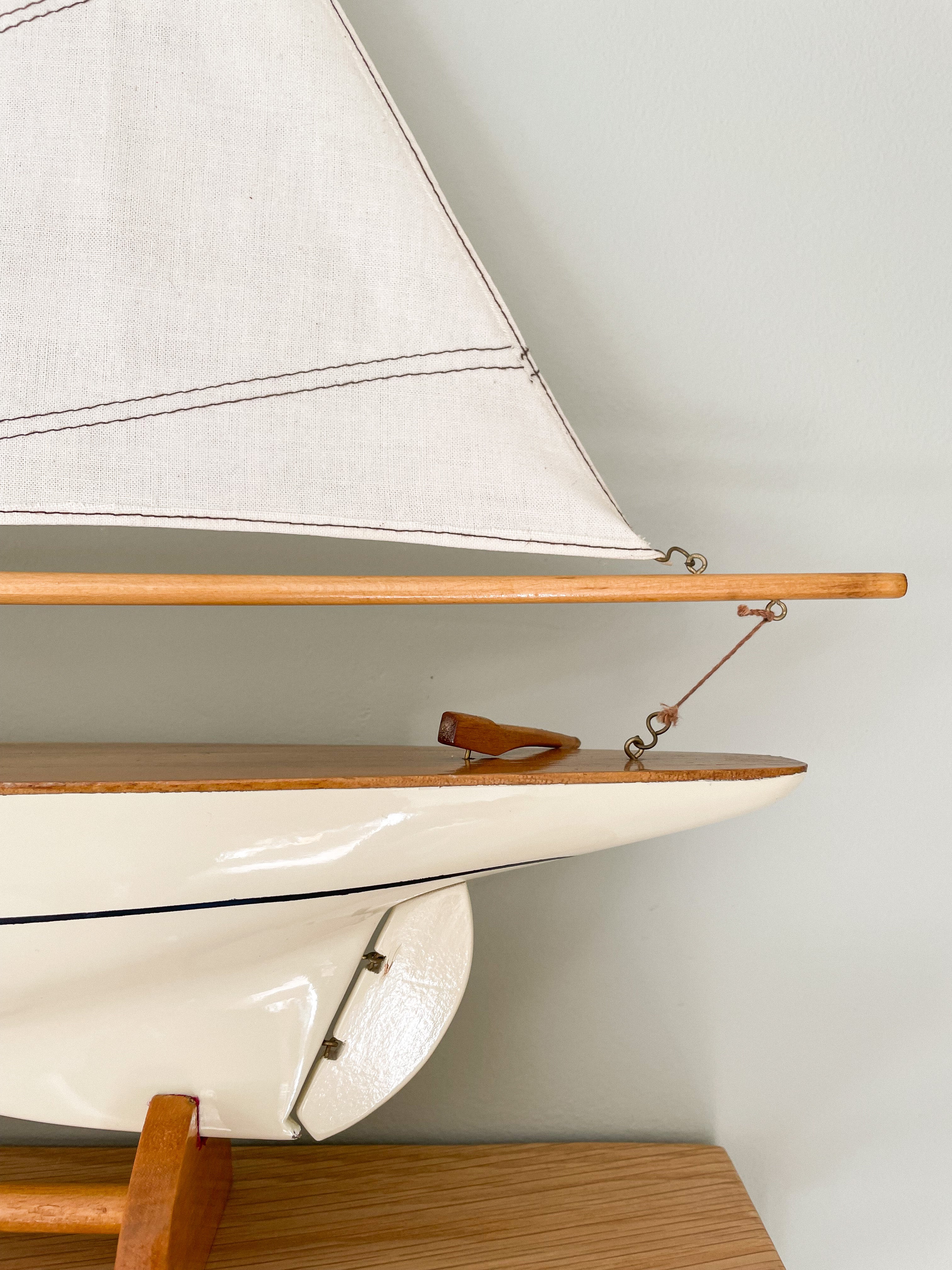 Vintage wooden model sailing boat, pond yacht or ship in white - Moppet