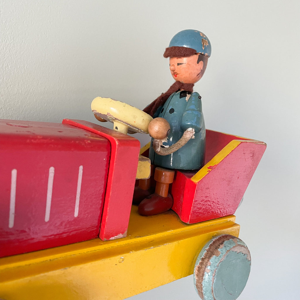 Vintage wooden Czech red pull-along tractor with driver - Moppet