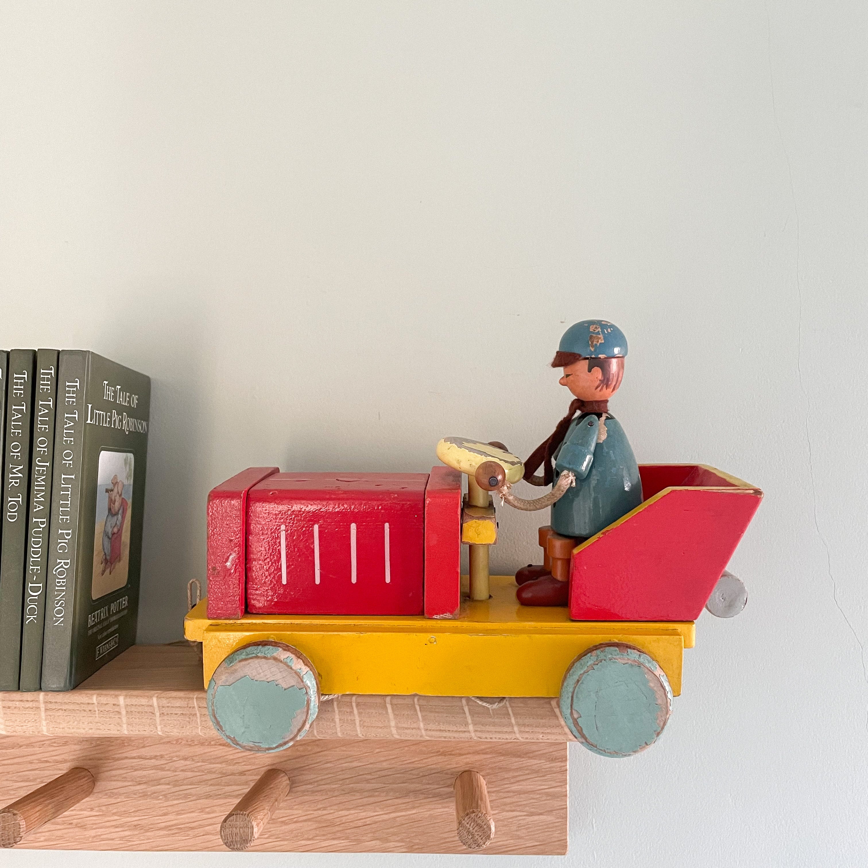 Vintage wooden Czech red pull-along tractor with driver - Moppet