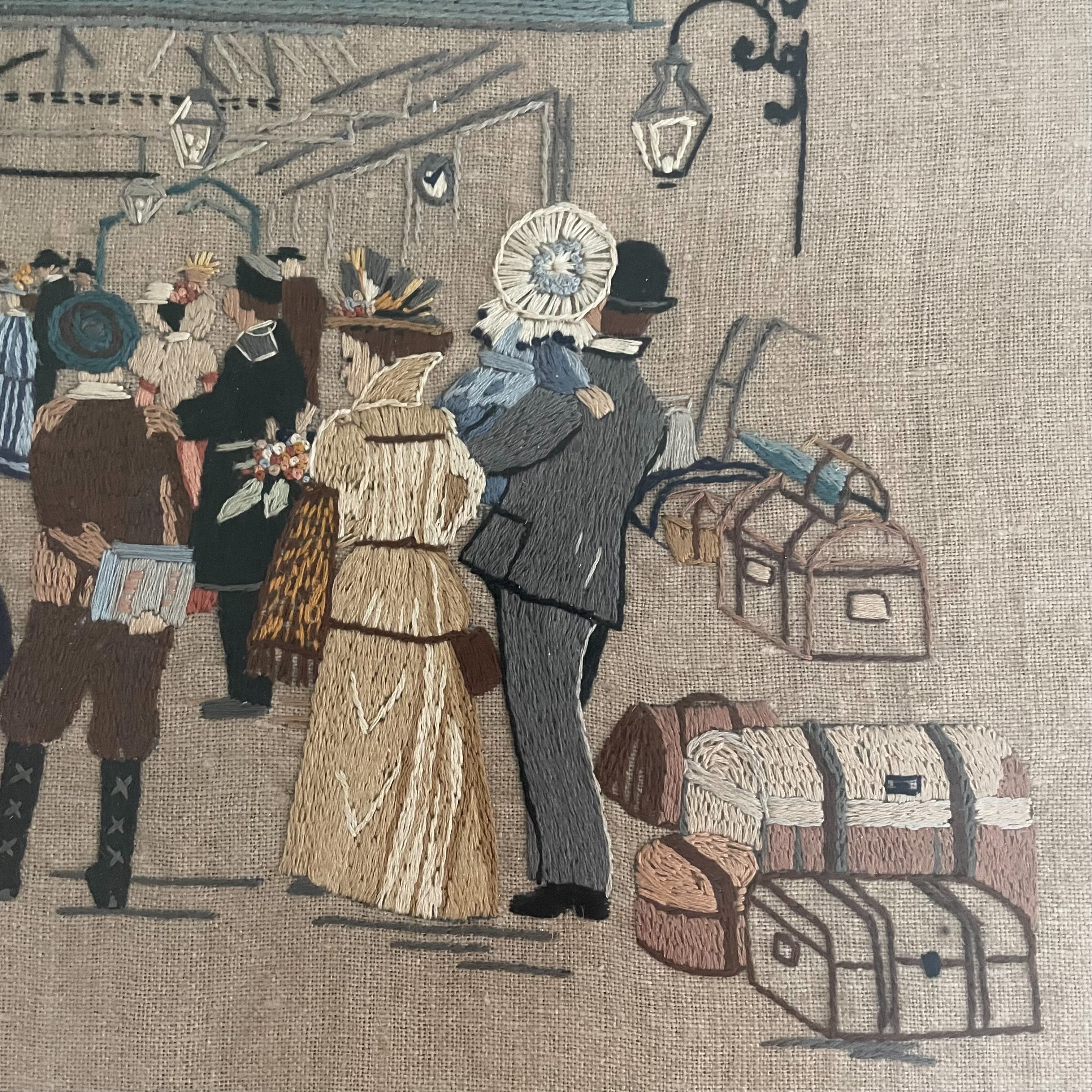 Vintage framed embroidery of train and passengers - Moppet