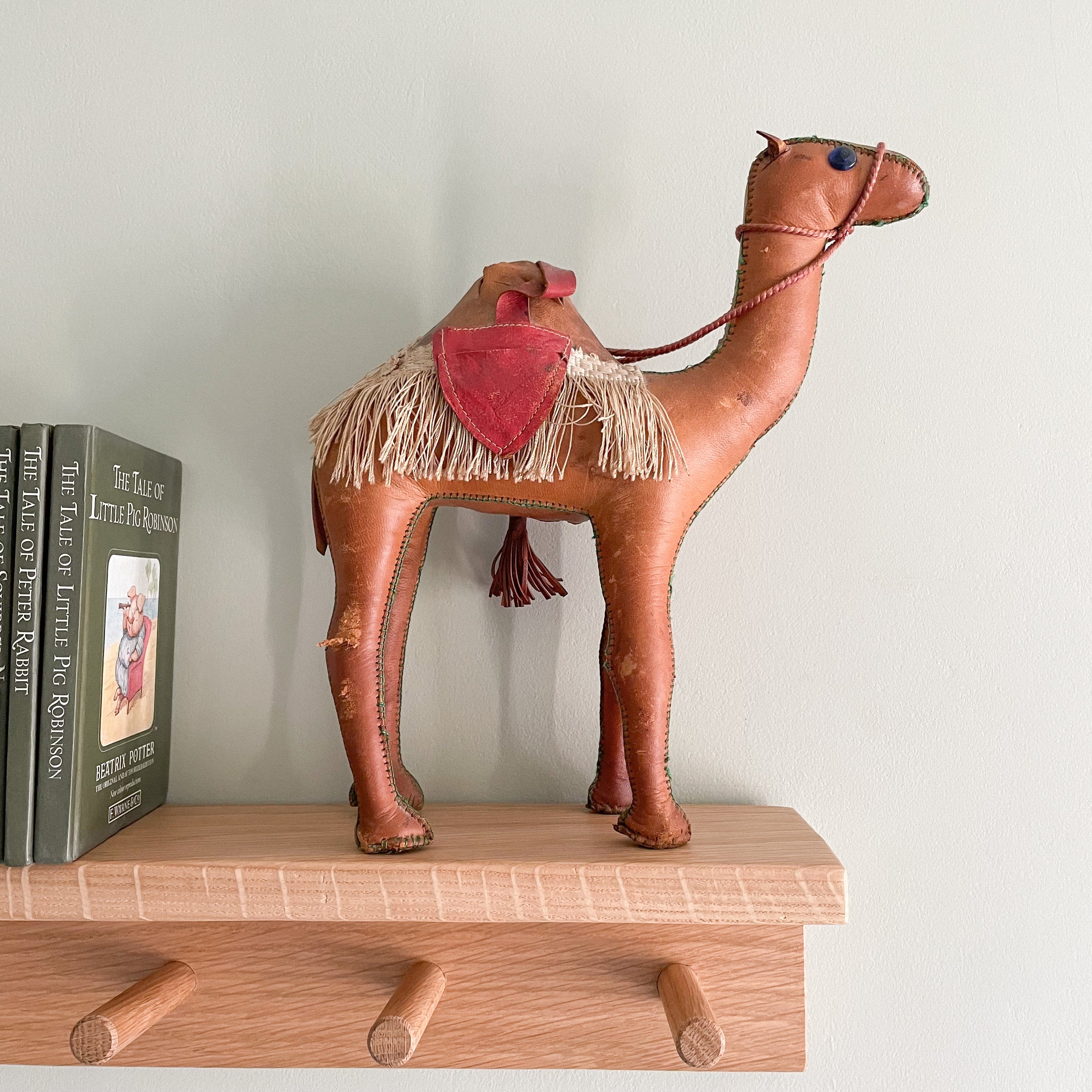 Vintage handmade leather-wrapped wooden camel figurine - Moppet