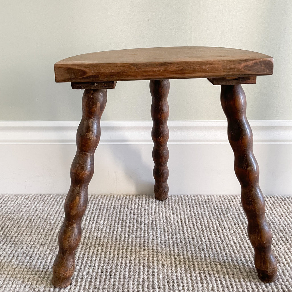 Vintage wooden French milking stool with three bobbin turned legs and a half-moon seat - Moppet