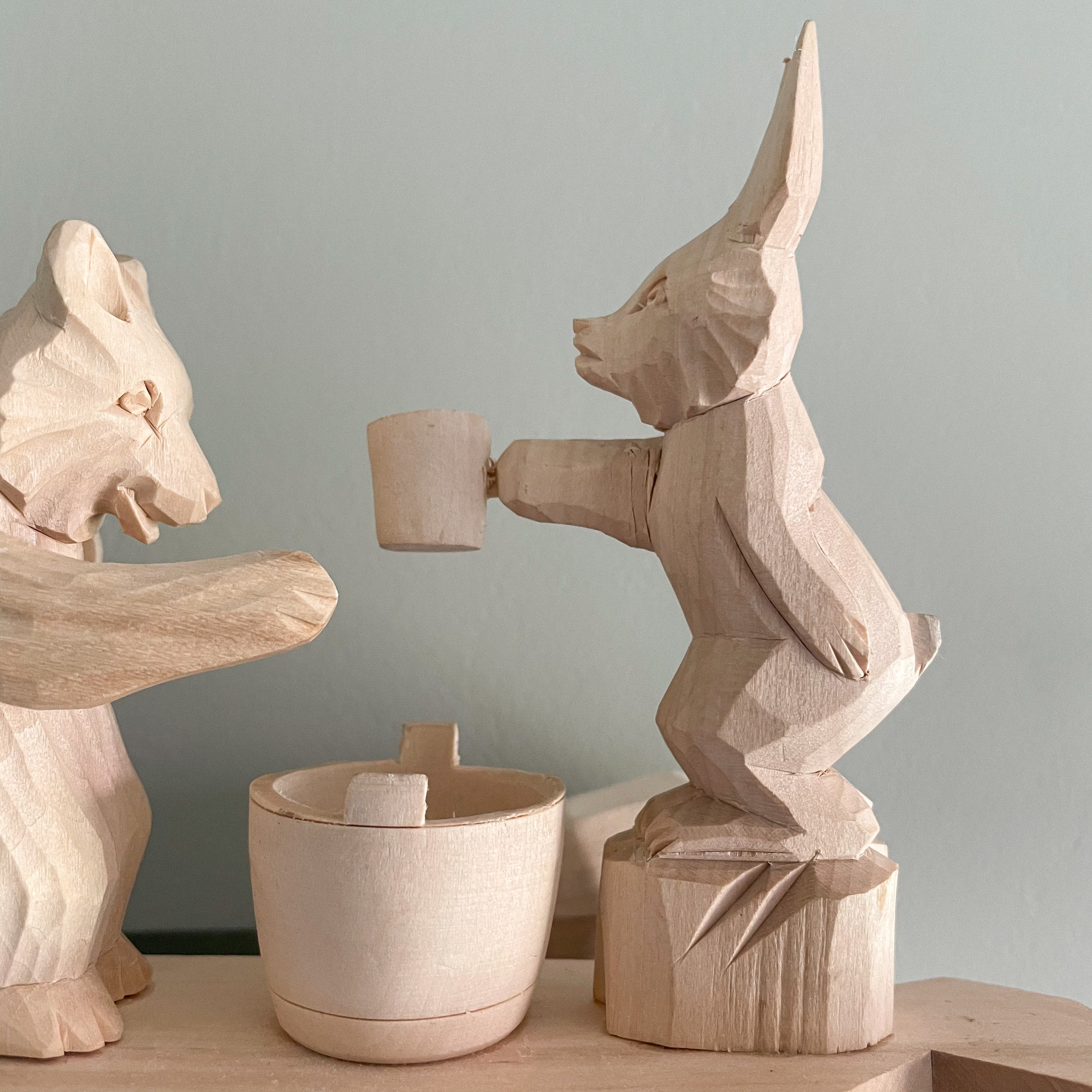 Hand-carved wooden traditional Russian folk toy featuring a rabbit and a bear - Moppet