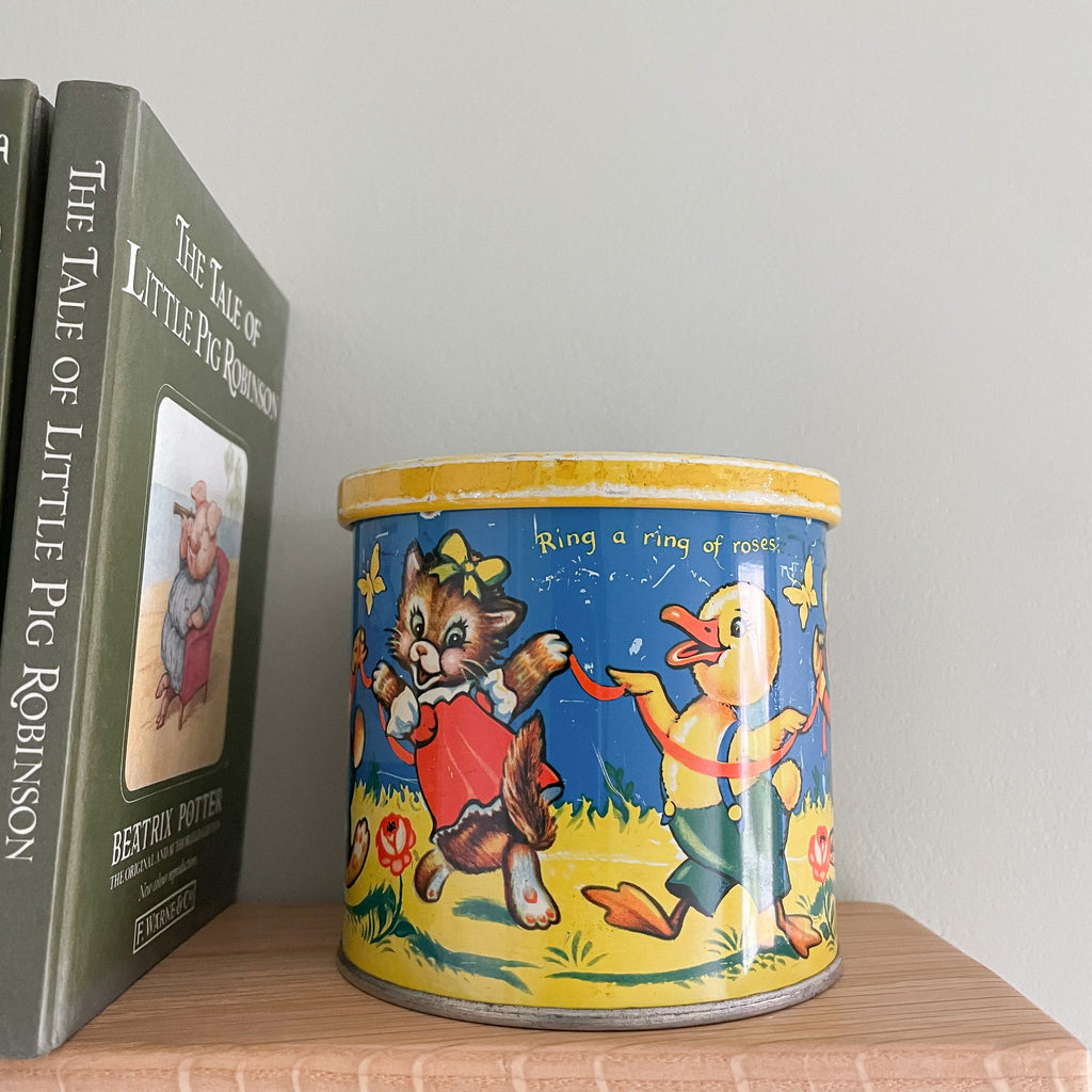 Vintage 1960s children’s tin with animals singing 'Ring a ring o’ roses', by Blue Bird Toffee - Moppet