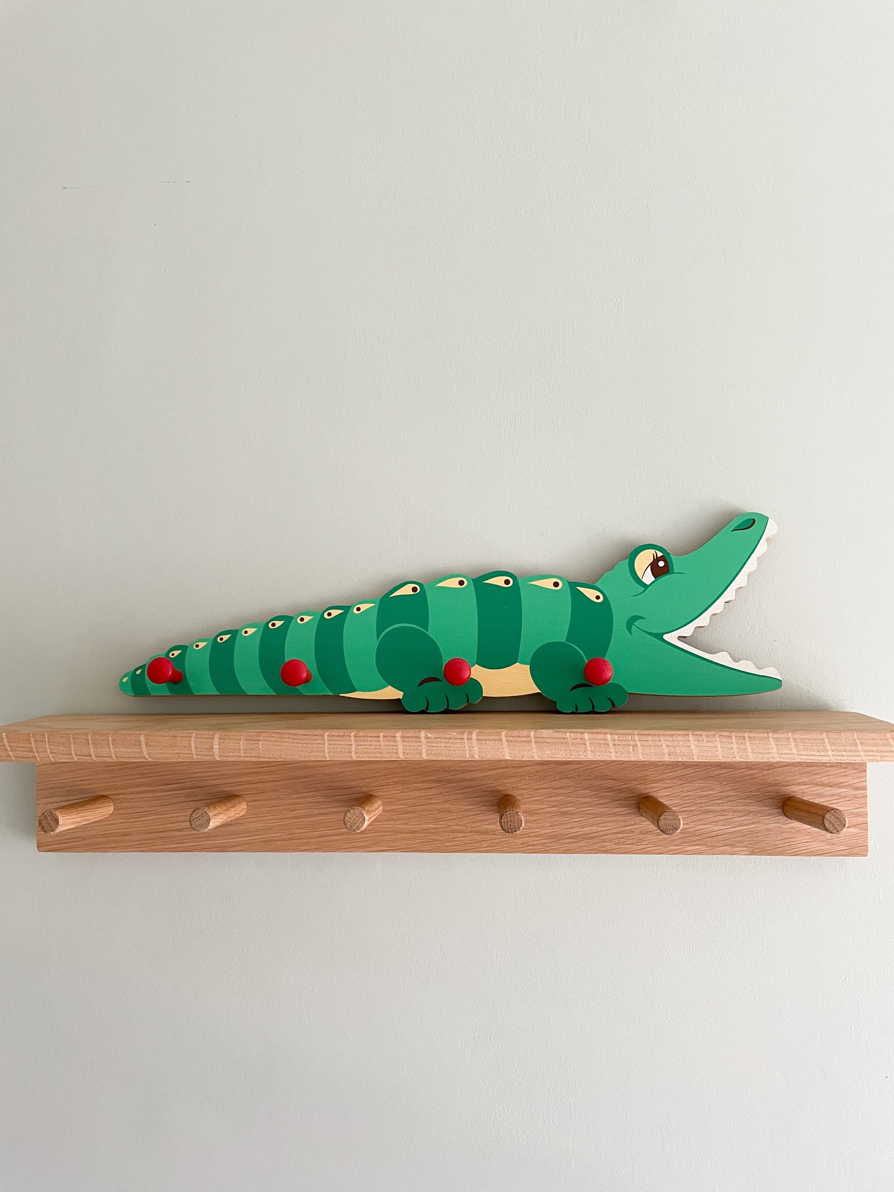 Vintage 1980s German wooden peg rail coat hook with green crocodile design, by Mertens Kunst - Moppet